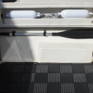 Dink oar stowage in cockpit.