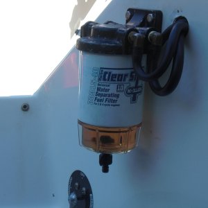 New fuel/water separator with water drain off bowl.