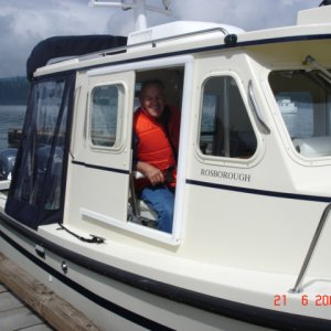 21 August Cornet Bay
Joe in the helm seat