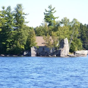 Talk about water front, this camp takes up the whole island. Obviously grandfathered out of today's set back codes.