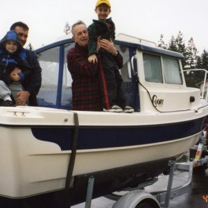 5 April 2003 - Showing the C-Dory to some of the family.  The youngest grandson wanted to know how soon we'd be going out in the "fish water"