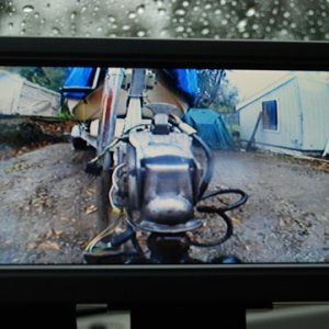 Media 'Backup Cam: Aftermarket "Peak" 7inch bought on E-bay $85 delivered. 15 min. easy install. Picture in rain at dusk with wet camera lens. Makes it super easy to attach boat single handed.' in album 'Backup Cam: Aftermarket "Peak" 7inch bought on E-bay $85 delivered. 15 min. easy install. Picture in rain at dusk with wet camera lens. Makes it super easy to attach boat single handed.'