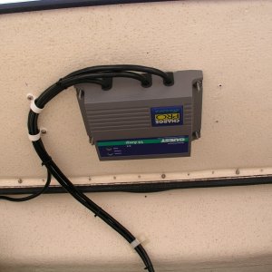 Media '(Bluecrab) Battery charger mounted beneath seat.' in album '(Bluecrab) Transom bench seat with cushion installed.'