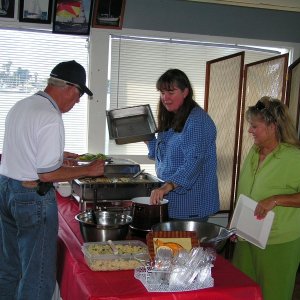 Hostess Pat "working the Alaskan halibut"!