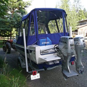 1kw generator
the generator can be used where it is. the controls face forward and it is exhausted over the port side.