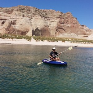 Rob taking photos and paddling on a WindGlider