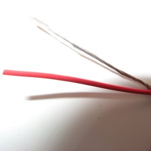 The manual for the Icom 422 makes no mention of the wires for the NMEA in, out and speakers being coaxial.  They are.  The negative is carried in the outer braid.  These are small wires.  That center wire is hard to strip.