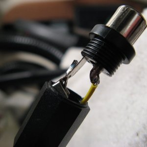 This one looks a little better.  The negative solder joint is not cold...there is some nice solder that you can't see in the photo.

UPDATE:  These connectors ended up totally failing.  I would not use them.  The signal from the GPS was intermittent a high percentage of the time.  I've replaced this with different connectors.  Need to update this area. -- Mike