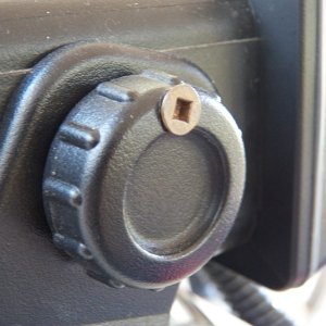 Media 'Like most radios, mine just has twist knobs to hold it to the bracket.  I used the right length screw to drill a hole through the knob and into the bracket (and not into the radio).  The bracket can't be removed with the radio in place.  A thief would need to figure out the problem and have a short-shaft #2 square drive screwdriver.' in album 'Like most radios, mine just has twist knobs to hold it to the bracket.  I used the right length screw to drill a hole through the knob and into the bracket (and not into the radio).  The bracket can't be removed with the radio in place.  A thief would need to figure out the problem and have a short-shaft #2 square drive screwdriver.'