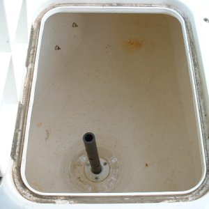 Media 'Here?s a shot of the drain tube installed.' in album 'Here are some photos of the live bait well plumbed into the port laz by the dealer for the previous owner. The clear hose with check valve on the left is the intake for the manual bilge pump. This photo shows the bait pump with bronze through hull and valve.'