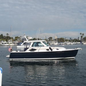 Media 'Coronado Yacht club sailpast Jan 1 some nice boats' in album 'Boathouse restaurant'