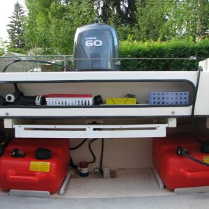 Fuel tanks/battery/ cleaning table storage w/ room for a utility box