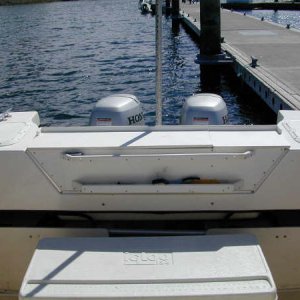 Nice addition, for storage, fish, bait, etc., not to mention a place to put your beer!  Made of Starboard.