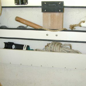(Mason C. Bailey) 
Extra storage below the factory gunwales.  Did this on both sides.