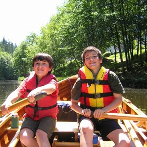 Mason and friend rowing up the slough past Wayne Golf course.