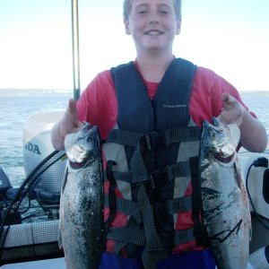 Logan with Jeff Head Silvers

Caught @ 55' with Green glow hootchie and hearing strip.  7/5/2011