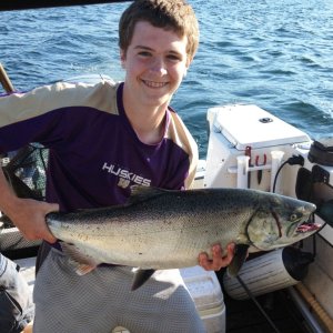 Parker's best king yet.  4" cookies & cream close to the bottom in ~100' of water close to Pt no Pt.  Also, got a nice hatchery coho @ 55' with a freshly tied white UV squid.  bonus 2 crabs.  Great Day 7/26/14