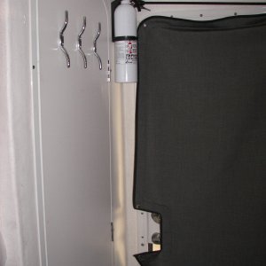 Media 'Outside view of hooks.  I am putting a couple more on the door jamb forward of these.' in album 'Perko rod storage area'