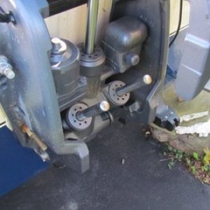 Media 'Just tilt motor up all the way' in album 'P1000486 Some scrap 3 x 4" aluminum angle 1/2" stainless u-bolt 35 dollar stainless turnbuckle, short piece of chain, and a shackle.'