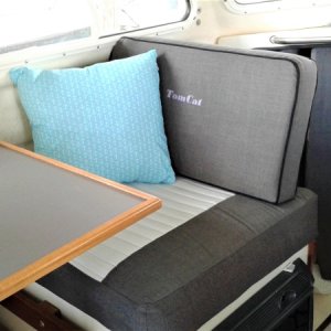 Adding new upholstry covers over original with extra padding makes it more comfortable, looks nice and you still have original as a back up.