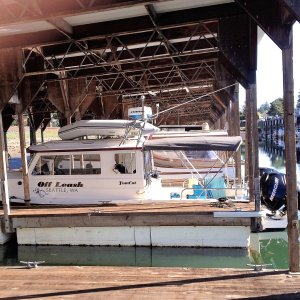 I have found covered slip storage if you can find is worth the extra money to keep her gelcoat nice and the boat clean and ready to go when you are.