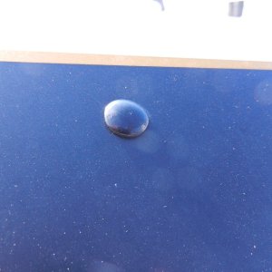 I used gloss black enamel on the bolt heads after sanding them a bit first.