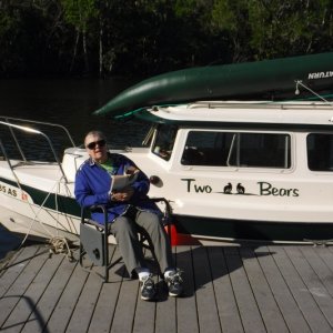 Two sets of bumpers.  
The Red bumpers balls, one behind Penny\'s leg,  are on a short fixed tether and have snaps that go to cleats.  Good for many docks.  The green longer bumpers are on a longer line and need to be tied to fit where needed.  Some docks are too high or two low and sometimes you raft to a larger boat.