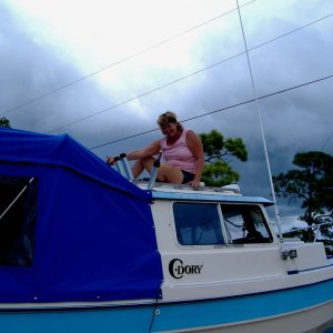 Judy is on top of the final Camper Top  fitting.
Total Cost of Materials was $704.00
Total Hours of Production was 48
Free Labor of Talented Lady..Priceless