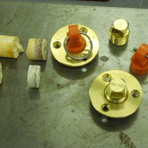 Media '1" cores cut from transom. Closed cell foam core. Garboard flanges and plugs. Orange plugs are emergency spares.' in album '1" cores cut from transom. Closed cell foam core. Garboard flanges and plugs. Orange plugs are emergency spares.'