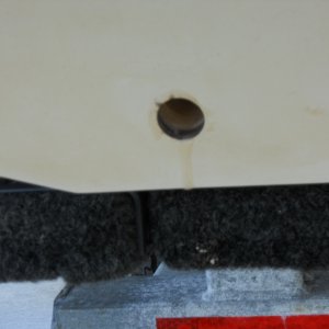 Media '1" hole in Port transom. sealed with epoxy.' in album '1" cores cut from transom. Closed cell foam core. Garboard flanges and plugs. Orange plugs are emergency spares.'