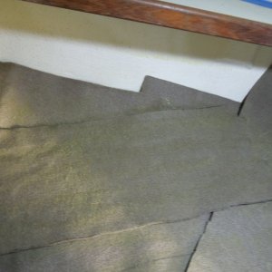 Spray the backside of the carpet, I used carpet remnants around the sides to catch over spray. These remnants can still be used