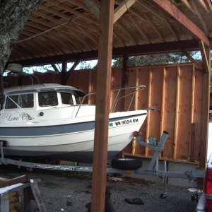 Media 'boat house' in album 'Pick up the new boat Friday, to Lopez on Saturday!  It's LunaC!  Nick on board as deck hand.'