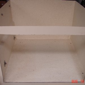 Front passenger seat base cut out for drawers
