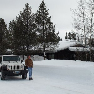 Jay by jeep in front Colter Bay, Marina Information Building