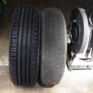 My "new" 13" tire next to my new 15" tire.  The 13" tire has about 2,500 miles on it and the left hand outer tread has worn below the siping (and I just rotated them for that reason).  Looking at the top profile, both shoulders are wearing faster than the center despite maximum pressure (50 psi).