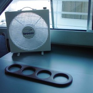 Endless Breeze 12-v 3-speed fan helps circulate air.  Often, it's all that's needed.