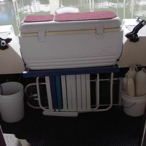 Cooler Rack: Creates a lot of floor space and adds some nice elbow height workspace on top.