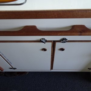 railing in front of under galley storage