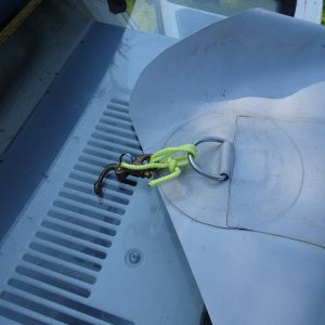 quick release spinnaker halyard shackle attaches deck rain protector/shade to eye bolts under cabin lip