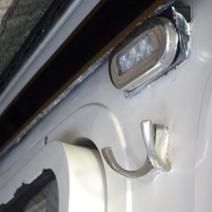 Red cockpit light and hook for clothing (foul weather gear if raining)