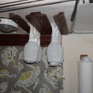 Wine glasses in white sox, and holder.  paper towel holder.  All inderior lights are LED.  Many have dual red and white, bright and dim settings.