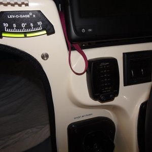 athwartship level gauge (heel or roll) display for auto retract trim tabs, and trim tab switch