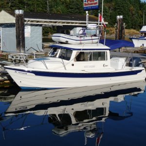 Pacific Wanderer 2009 23 Venture with a 150 HP Yamaha 4 stroke and a 9.9 HP Yamaha 4 stroke. She's another great boat for us and we plan on enjoying her for many years to come.