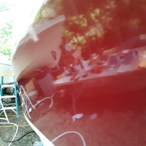 you may not see them in this photo, but the swirls from the 400 grit are still there.  however, this boat now looks really good, and it was looking pretty sad