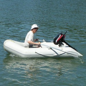 (Pat Anderson) Norm Lim (Sumeru) Out for a Row in Daydream's Dinghy