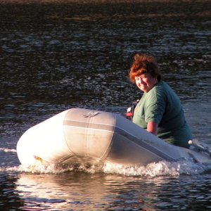 (Pat Anderson) Patty Motoring the Dinghy