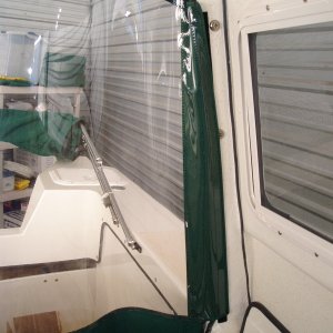 Drop curtain attached inside with velcro.