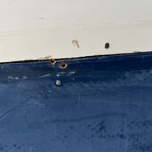 more holes under rub rail.  Like this the whole way.