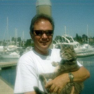 Aug 2006 - Bellingham 
   Jim & Molly aka 
the C-Brat Boat Cat 
     WILD BLUE