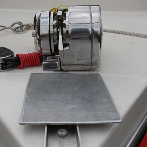 Windlass and backing plate